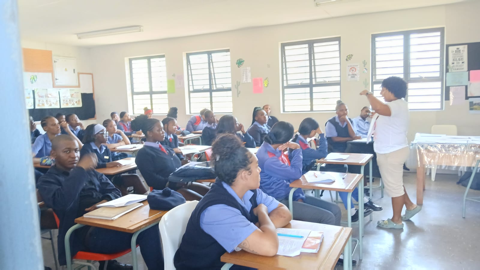 Delft learners engaged in a classroom lesson